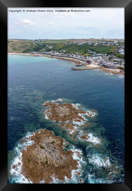 Sennen Cove from offshore Framed Print by Graham Moore