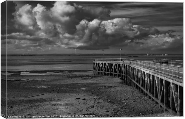 Abandoned pier awaiting the storm Canvas Print by Ann Biddlecombe