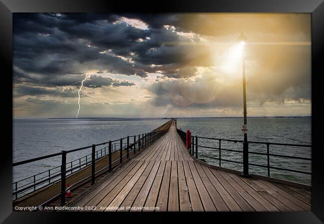 Southend on Sea pier as the storm comes in Framed Print by Ann Biddlecombe