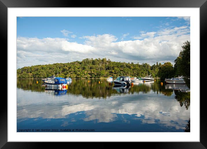 Moored Yachts Reflected Loch Lomond Scotland  Framed Mounted Print by Iain Gordon
