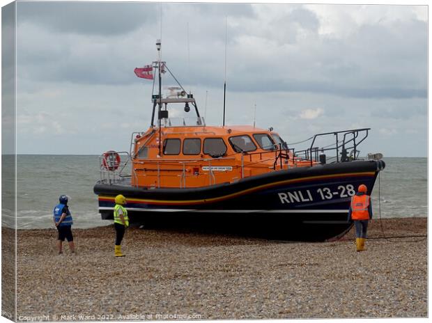 The Hastings lifeboat returning home. Canvas Print by Mark Ward