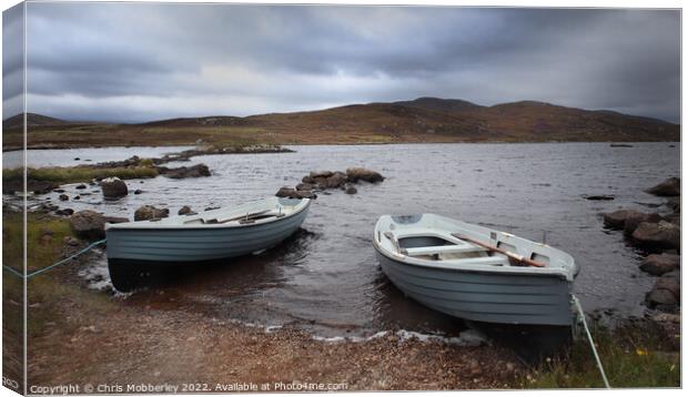 Boats in Outer Hebrides Canvas Print by Chris Mobberley