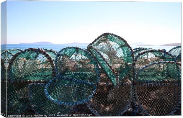 Lobster pots Canvas Print by Chris Mobberley