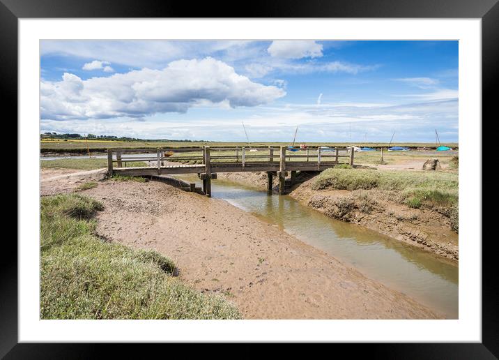 Bridge over a channel at Blakeney Framed Mounted Print by Jason Wells