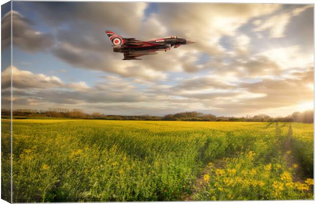 RAF Typhoon Eurofighter jet flying over rapeseed crops Canvas Print by Simon Bratt LRPS
