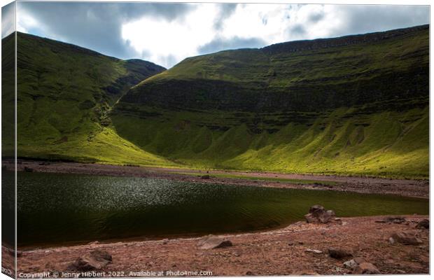 Light catching the mountain range at Llyn Y Fan Fawr Brecon Beacons Canvas Print by Jenny Hibbert