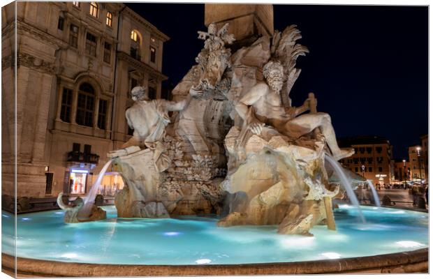 Fiumi Fountain at Night in Rome Canvas Print by Artur Bogacki