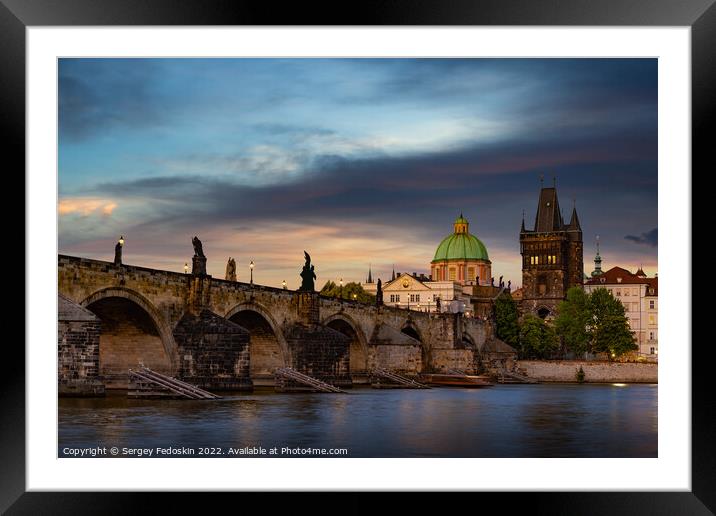 Colorful sunset view on old town, Charles bridge (Karluv Most - in czech) and Vltava river, Prague, Czech Republic. Framed Mounted Print by Sergey Fedoskin