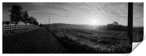 paving sett roadin autumnal sunlight in black and white Print by youri Mahieu