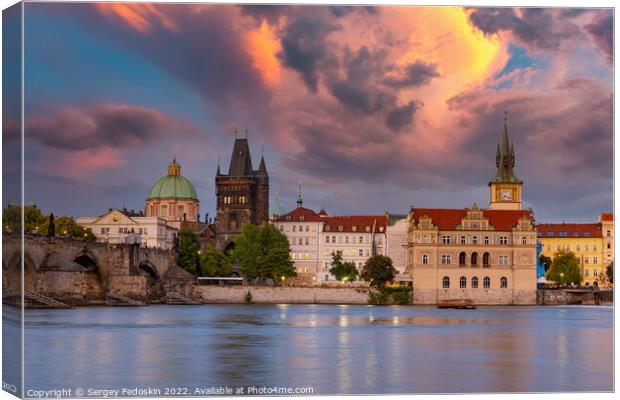 Colorful sunset view on old town, Charles bridge (Karluv Most - in czech) and Vltava river, Prague, Czech Republic. Canvas Print by Sergey Fedoskin