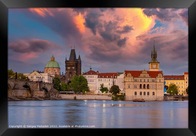 Colorful sunset view on old town, Charles bridge (Karluv Most - in czech) and Vltava river, Prague, Czech Republic. Framed Print by Sergey Fedoskin