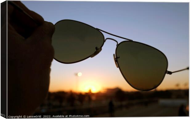 Sunset seen through a pair of sunglasses Canvas Print by Lensw0rld 