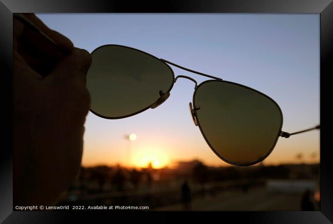 Sunset seen through a pair of sunglasses Framed Print by Lensw0rld 