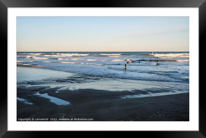 Surfers along the coast of Valencia, Spain during sunset Framed Mounted Print by Lensw0rld 