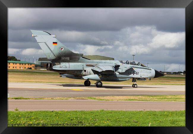A German Tornado taxi`s to the runway Framed Print by Clive Wells