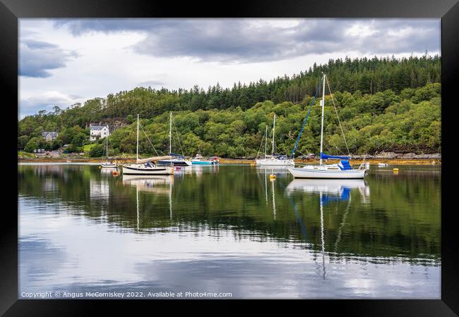 Yachts moored at Salen Jetty, Ardnamurchan Framed Print by Angus McComiskey