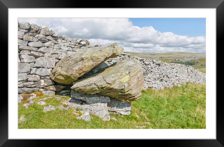 Glacial erratic in a wall.  Framed Mounted Print by Mark Godden
