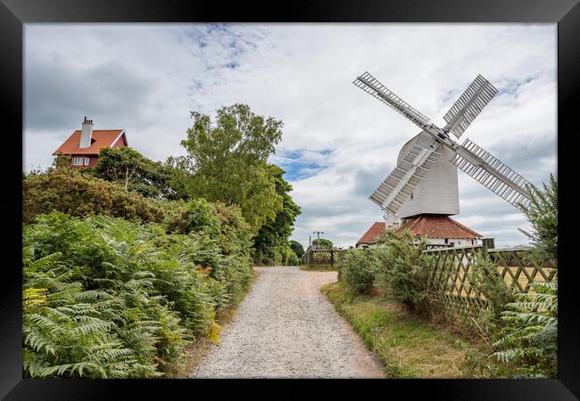 Thorpeness windmill next to the House in the Clouds Framed Print by Jason Wells