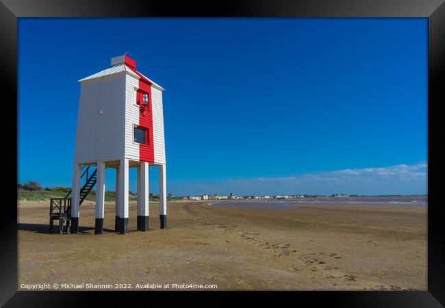 The wooden lighthouse on the beach near Burnham on Framed Print by Michael Shannon