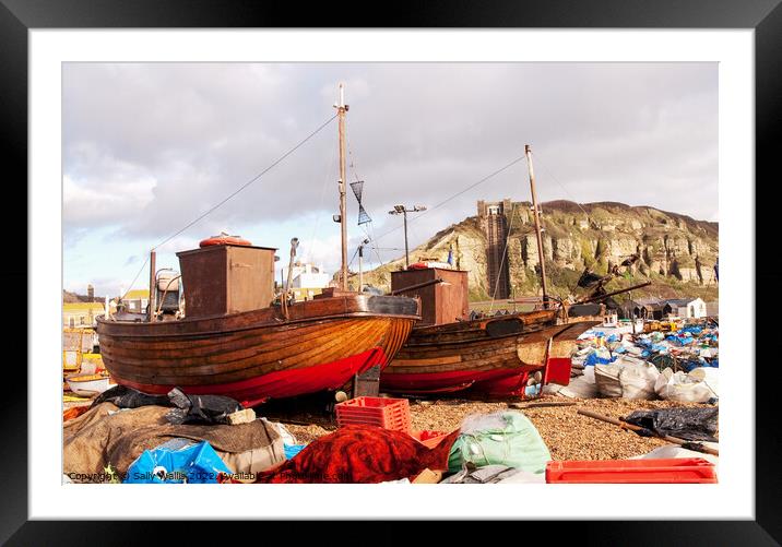 Clinker built fishing boats on Hastings Beach Framed Mounted Print by Sally Wallis