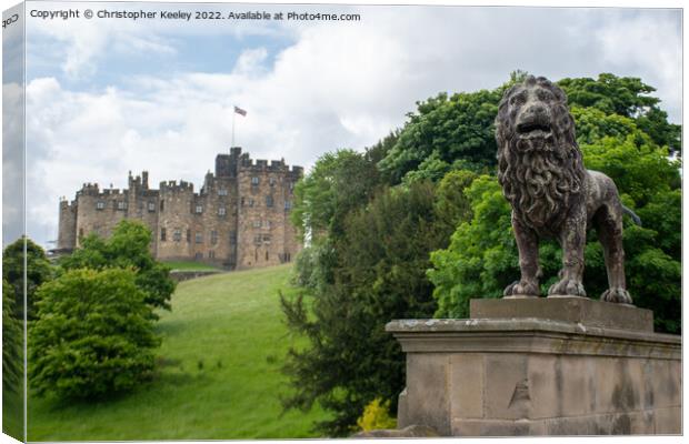 Alnwick Castle lion statue Canvas Print by Christopher Keeley