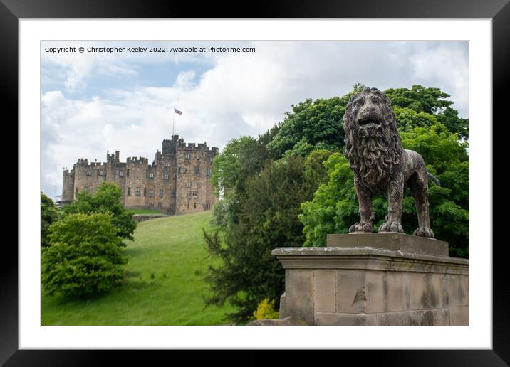 Alnwick Castle lion statue Framed Mounted Print by Christopher Keeley