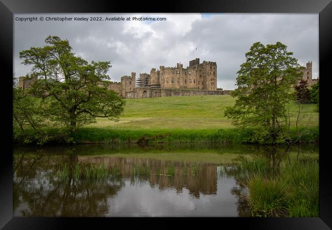Reflections of Alnwick Castle Framed Print by Christopher Keeley