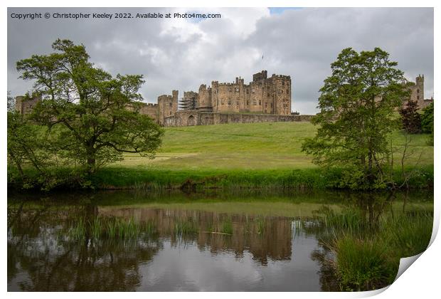 Reflections of Alnwick Castle Print by Christopher Keeley