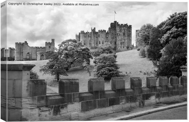 Alnwick Castle in black and white Canvas Print by Christopher Keeley