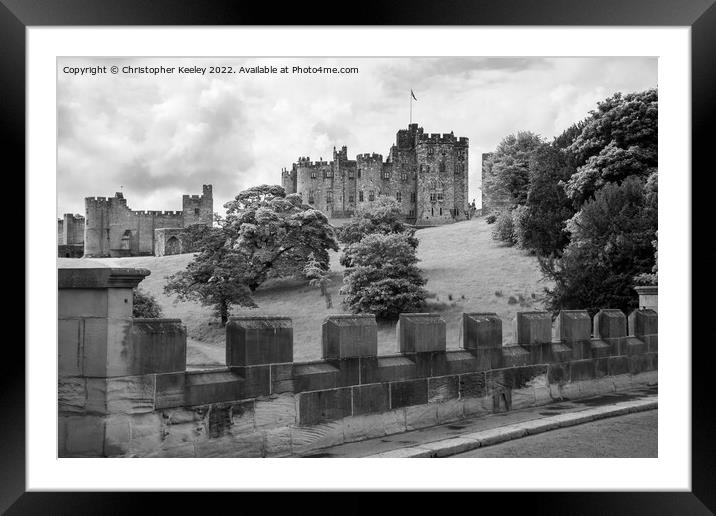 Alnwick Castle in black and white Framed Mounted Print by Christopher Keeley