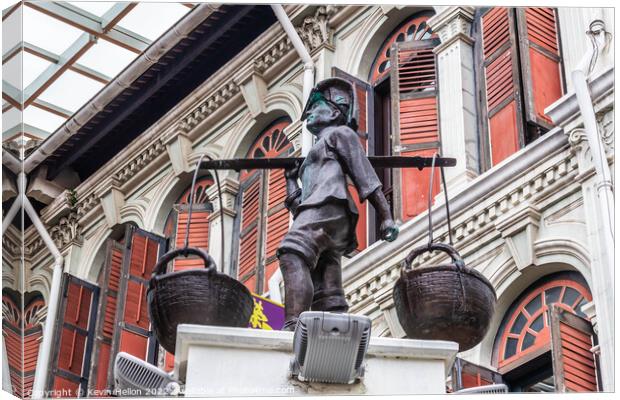Hawker sculpture on  Smith street, Chinatown, SIngapore Canvas Print by Kevin Hellon