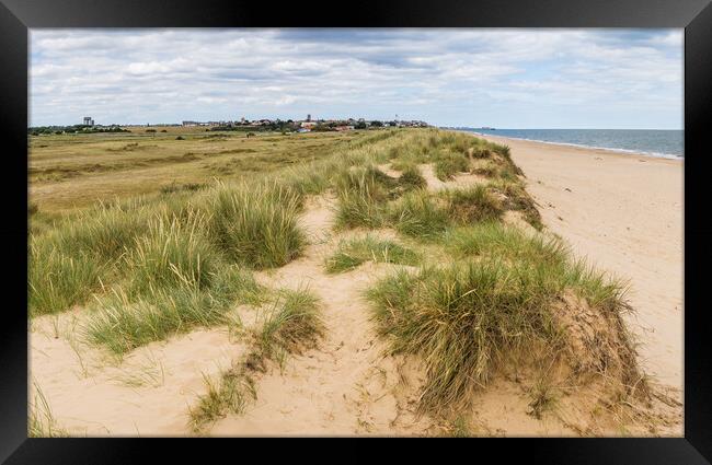 Southwold seen over the sand dunes Framed Print by Jason Wells