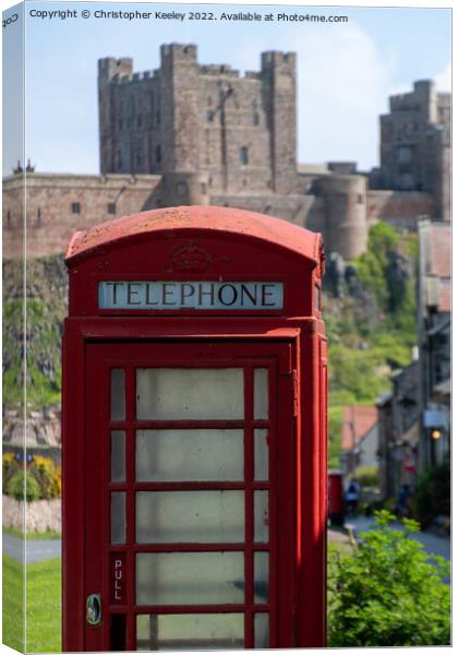 Telephone box at Bamburgh Castle Canvas Print by Christopher Keeley