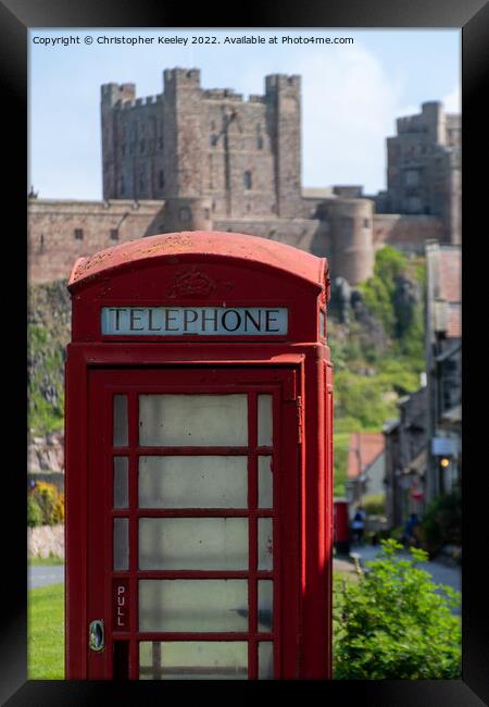 Telephone box at Bamburgh Castle Framed Print by Christopher Keeley