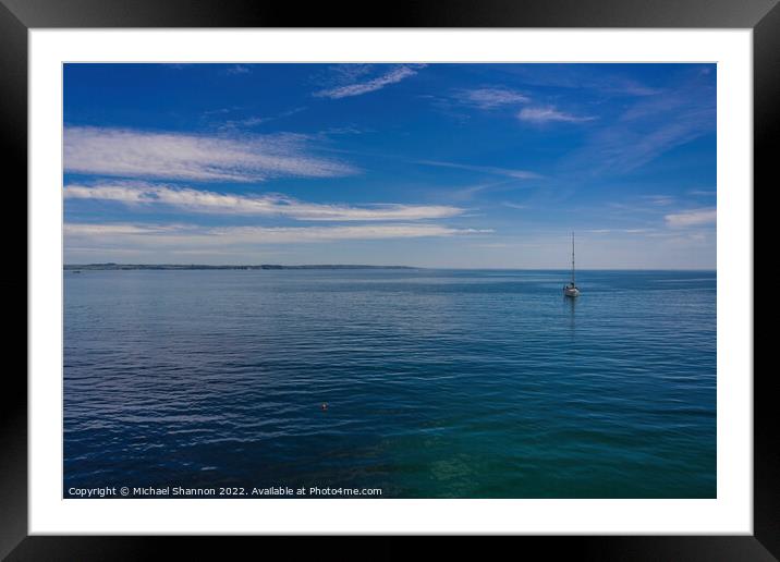 Yacht moored off Mevagissey in Cornwall Framed Mounted Print by Michael Shannon