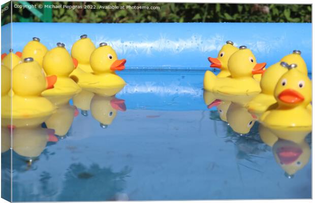 Selective focus. Many yellow rubber ducks swimming in circles in Canvas Print by Michael Piepgras