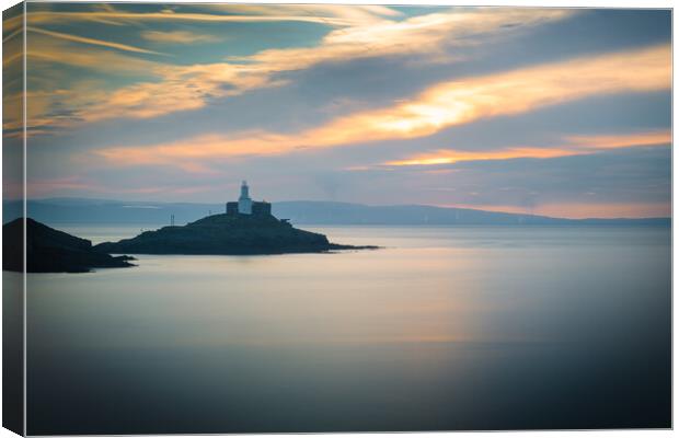 Mumbles lighthouse at sunrise Canvas Print by Bryn Morgan