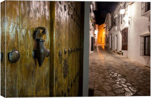 Night time back street scene in Grazalema, Spain Canvas Print by Chris North
