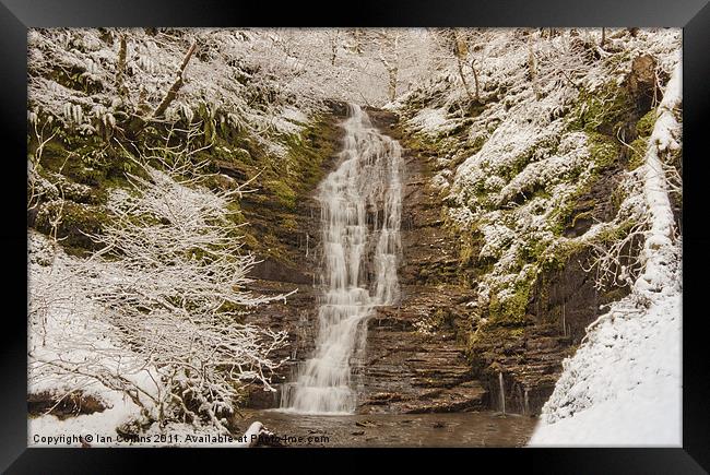 Snow Covered Waterfall Framed Print by Ian Collins
