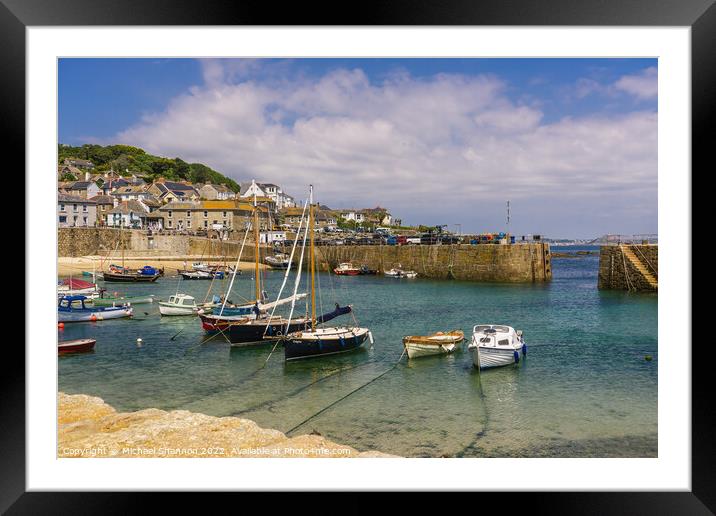 Yachts and small boats moored in Mousehole, Cornwa Framed Mounted Print by Michael Shannon