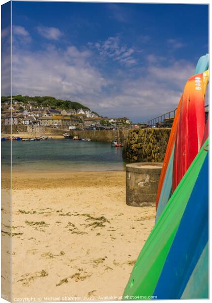 Surfboards stacked in Mousehole harbour, Cornwall Canvas Print by Michael Shannon