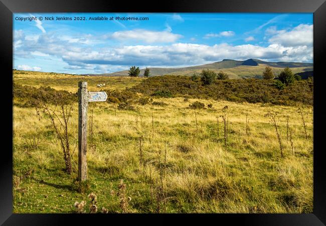 Wooden Post Aiming at Pen y Fan and Corn Du  Framed Print by Nick Jenkins