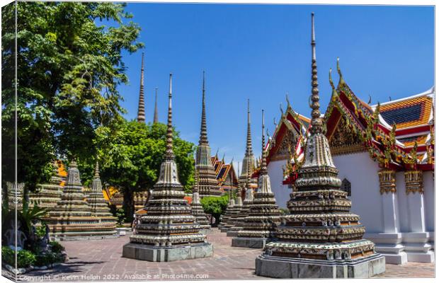 Stupas, Wat Pho, Bangkok, Thailand Canvas Print by Kevin Hellon