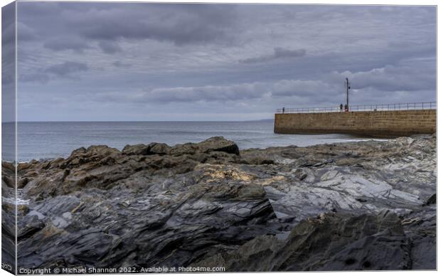 Rocks and Pier, Porthleven Beach Cornwall Canvas Print by Michael Shannon