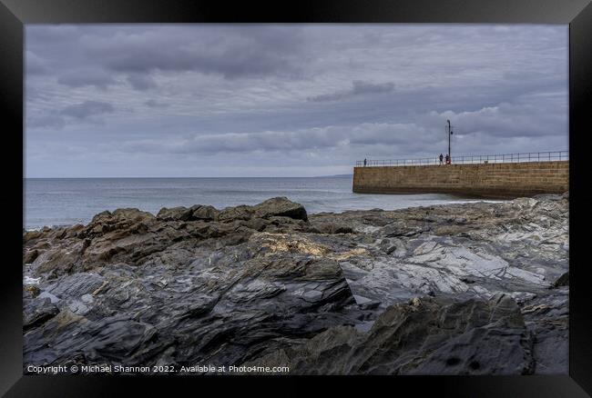 Rocks and Pier, Porthleven Beach Cornwall Framed Print by Michael Shannon