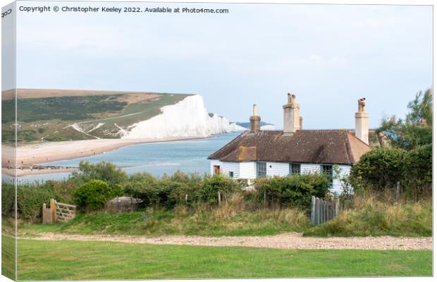 Seven Sisters Cliffs and coastguard cottage Canvas Print by Christopher Keeley