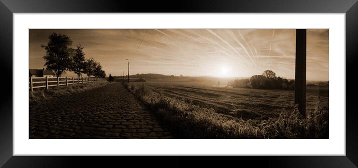 paving sett roadin autumnal sunlight in sepia Framed Mounted Print by youri Mahieu