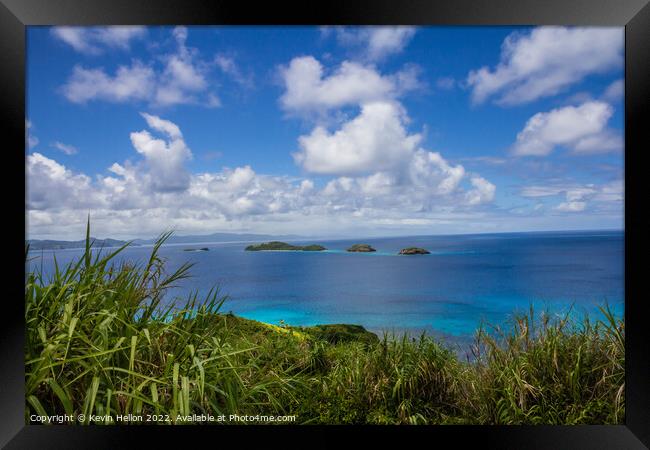 Small islands off Dravuni Island, Fiji, South Pacific Framed Print by Kevin Hellon