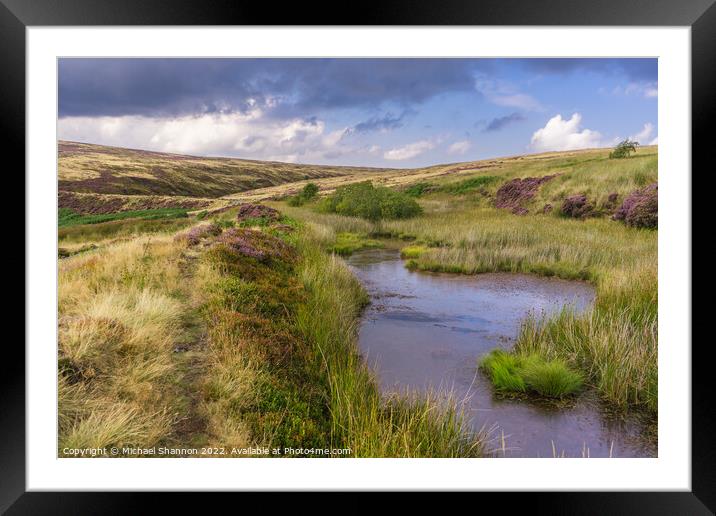 Patches of purple moorland and a small pond - Rose Framed Mounted Print by Michael Shannon