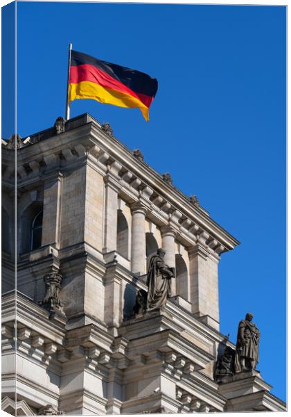 Reichstag And Flag Of Germany Canvas Print by Artur Bogacki